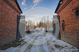 winter cityscape open vintage cast iron gate