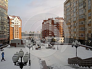 Winter cityscape. The pedestrian zone in the new residential are