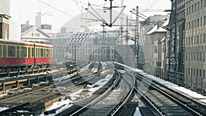 Winter cityscape with S-Bahn train, Berlin, Germany