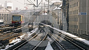 Winter cityscape with S-Bahn train, Berlin, Germany