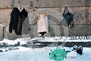 Winter clothes on the Peter and Paul`s fortess wall. Saint-Peteraburg, Russia.