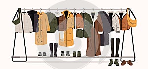 Winter clothes on racks. Men and women fashionable outfits for autumn and spring, trendy fashionable store with variety of