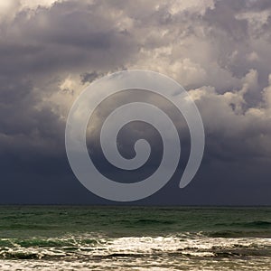 Winter clouds in the beach of Caesarea in the Mediterranean  sea