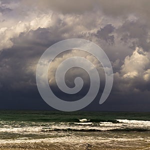 Winter clouds in the beach of Caesarea in the Mediterranean  sea