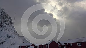 Winter Clouds Thicken over Norwegian Houses. Fast Motion