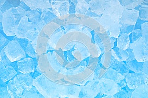 Winter cold blue ice cube texture background