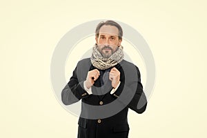 Winter is coming. Get ready for frosty days. Mature fashion model enjoy cold weather. Bearded man accessorizing outfit