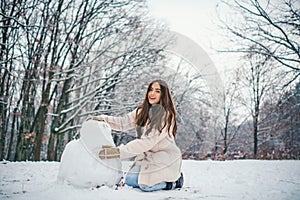 Winter concept. Global cooling. People in snow. Woman winter portrait. women on mountain. Winter portrait of young woman