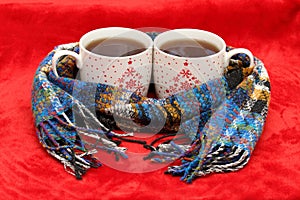 Winter concept with tea for two and a scarf