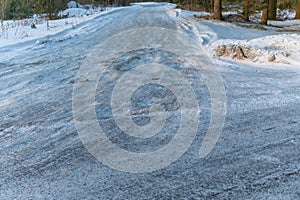 winter countryside bumpy road covered with ice