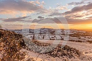 Winter countryside at sunset n snow at Tegg`s Nose Country Park, Macclesfield, UK