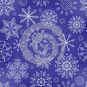 Winter dark blue background with snowflakes.