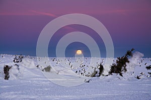 Winter dawn over the Sudeten mountains, Karkonosze, Poland