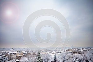 Winter day panorama and sky of Paris from above