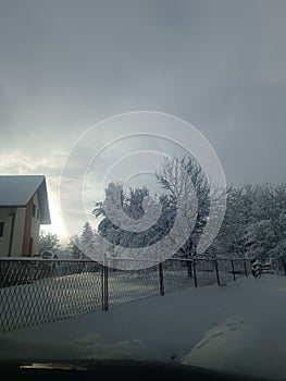 Winter day at the village mountain with a snow