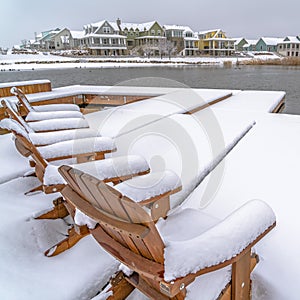 Winter in Daybreak Utah with chairs on a lake deck