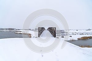 Winter in Daybreak with view of bridge over a lake