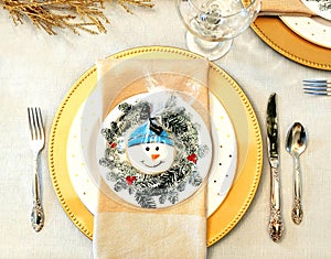 Winter Dinner Table Setting with Snowman