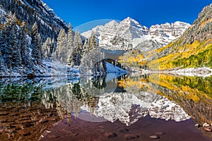 Winter and Fall foliage at Maroon Bells, CO photo