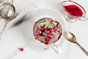 Chocolate mugcake with cranberry photo