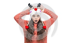 winter fashion for shocked teen girl. earflap hat knitwear. teen girl model in earflap hat. teen girl