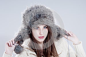 Winter fashion woman in a fur hat.