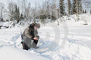 Winter fisherman