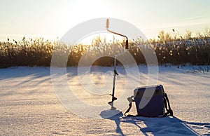 Winter fishing. Dawn in winter