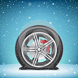 Winter flat tire on snow background