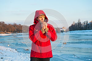 Winter flu. Flu and cold. love winter nature. man in red parka. winter male fashion. warm clothes for frost. chill