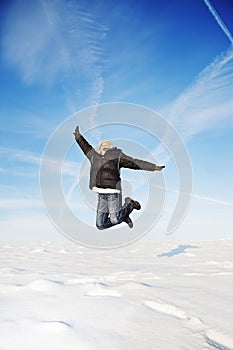 Winter fly jump happy man