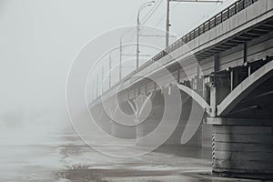 Winter fog in Voronezh. Chernavsky bridge fading in fog