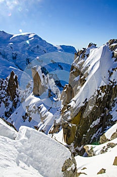 Winter in french mountains. French Alps covered with snow. Panoramatic view of Mont Blanc in the left side of the photograph.