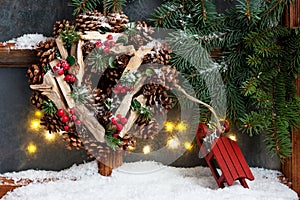 Winter  frost window with Christmas decorative wreath