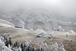 Winter frosty landscape of the beautiful Transylvanian village