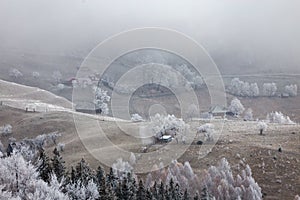 Winter frosty landscape of the beautiful Transylvanian village