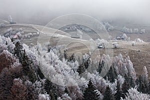 Winter frosty landscape of the beautiful Transylvanian village