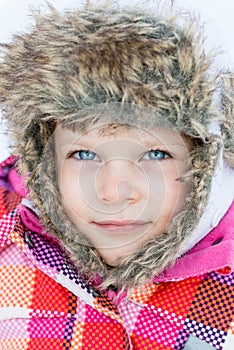 Winter fun - Portrait of Happy child girl on a winter walk