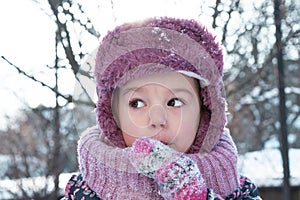 Winter, games, family, childhood concepts - close-up portrait authentic little preschool minor 3-4 years girl in pink