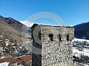 Winter Georgia. Svaneti Region, mountain city Mestia. Svan Towers. View from above, perfect landscape photo, created by drone.