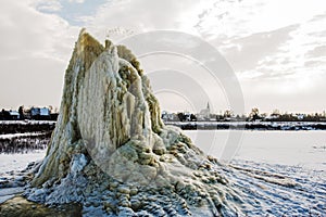 Winter geyser on sludge fields