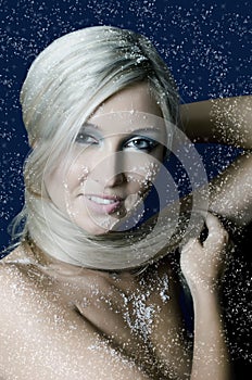 Winter Girl with beautiful make up and snow flake