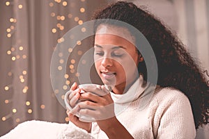 Winter girl in cosy room