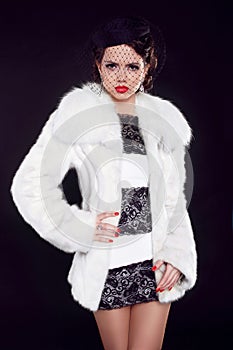 Winter Girl in Luxury Fur Coat, Fashion lady isolated on black b