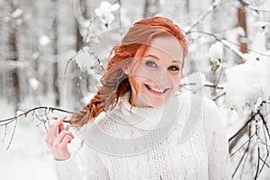 Winter girl portrait in december forest