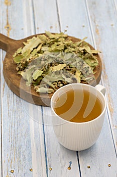 Winter herbal tea on a blue wood background. Winter tea