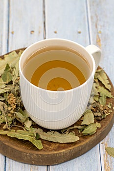 Winter herbal tea on a blue wood background. Winter tea