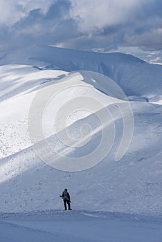 Winter Hiking Adventure in Snowy Mountains