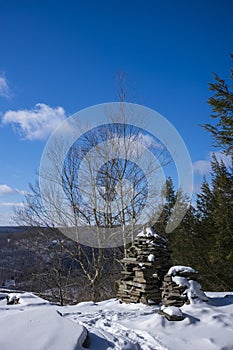 Winter hiking along the Bouchoux Trail at the Hancock Forest Preserve in New York State