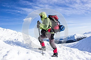 Winter hiking in the mountains .